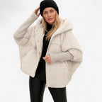 Klara – Dámská oversize prošívaná bunda s kapucí a žebrovanými manžetami, casual