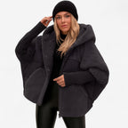 Klara – Dámská oversize prošívaná bunda s kapucí a žebrovanými manžetami, casual