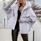 Klara – Dámská oversize prošívaná bunda s kapucí a žebrovanými manžetami, casual